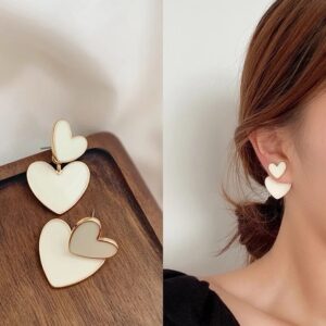 white heart dangler earrings