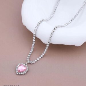Pink rhinestone heart pendant necklace with zirconia crystals on a tennis chain, elegant and romantic jewelry gift for women.